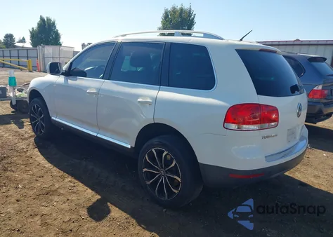 2007 Volkswagen Touareg V6 z USA, uszkodzony, nr VIN WVGZE77LX7D056124